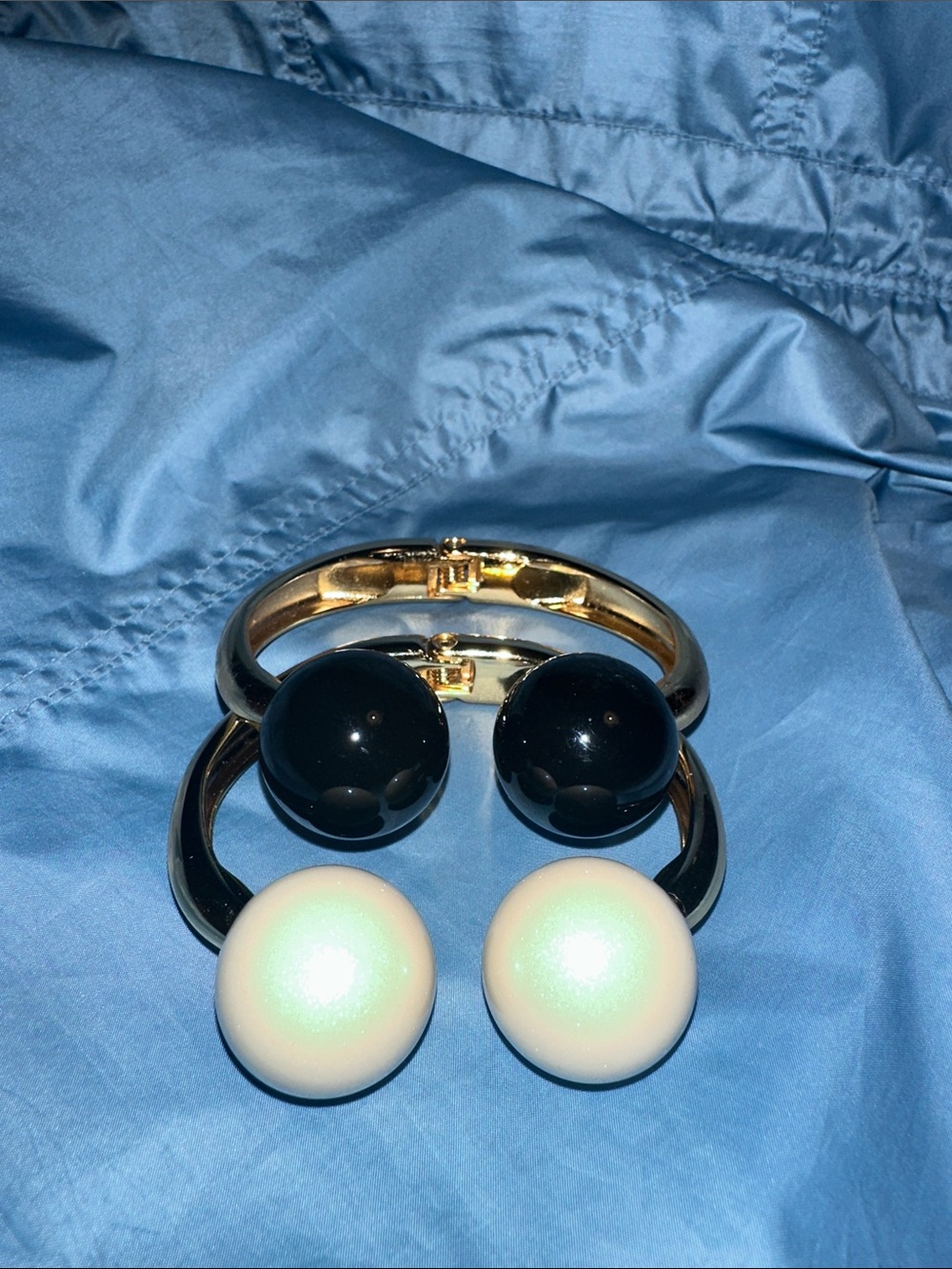Pair of Gold-Tone Cuff Bracelet with Black and White Pearl Ball Accents